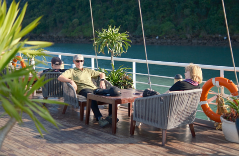 chatting with friend in The CatBa Catamaran's balcony